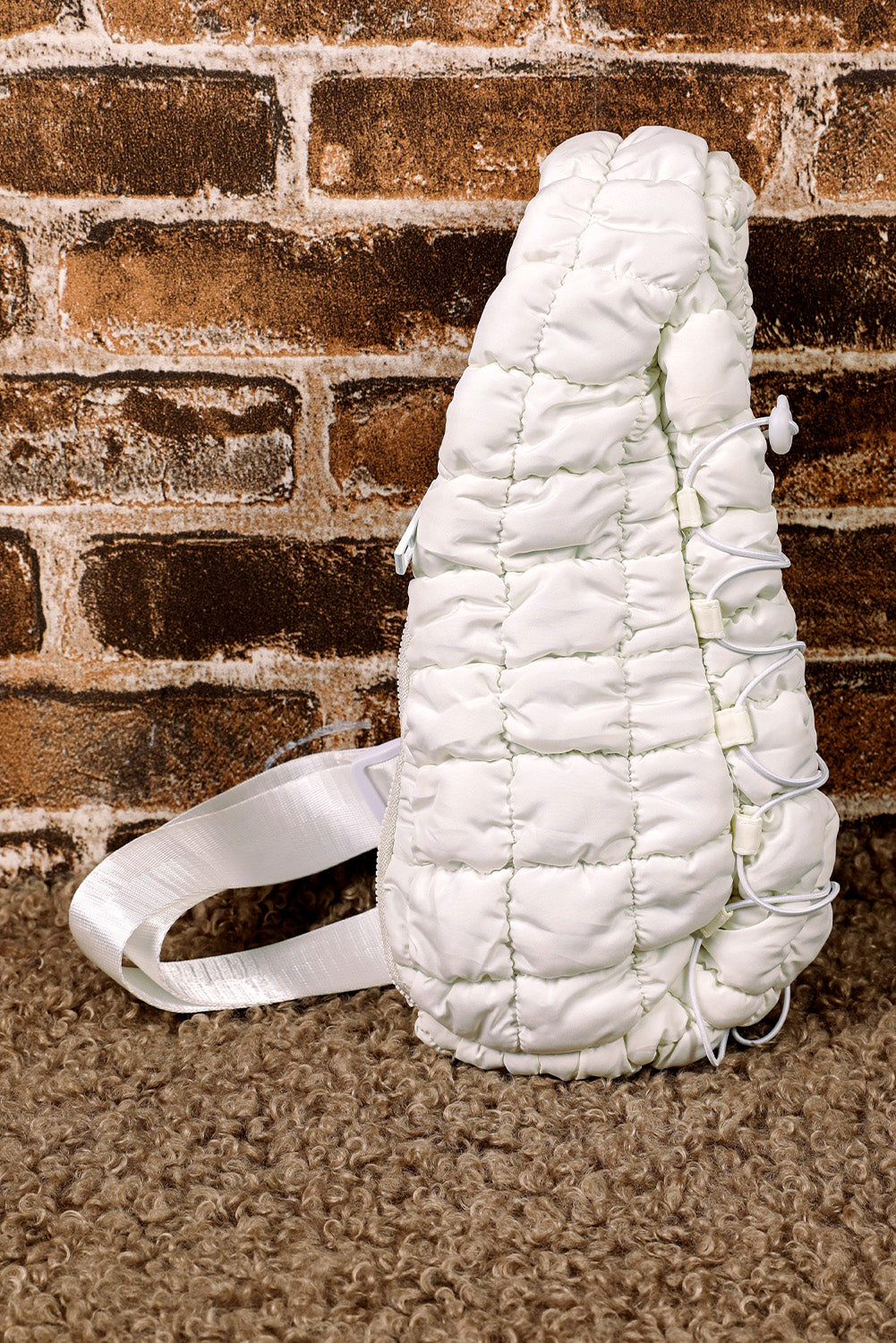 Wisteria Marshmallow Quilted Drawstring Crossbody Bag
