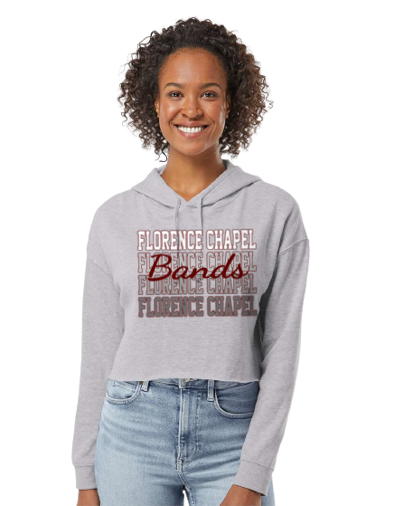 Woman wearing a gray hoodie with 'Florence Chapel' text on a white background